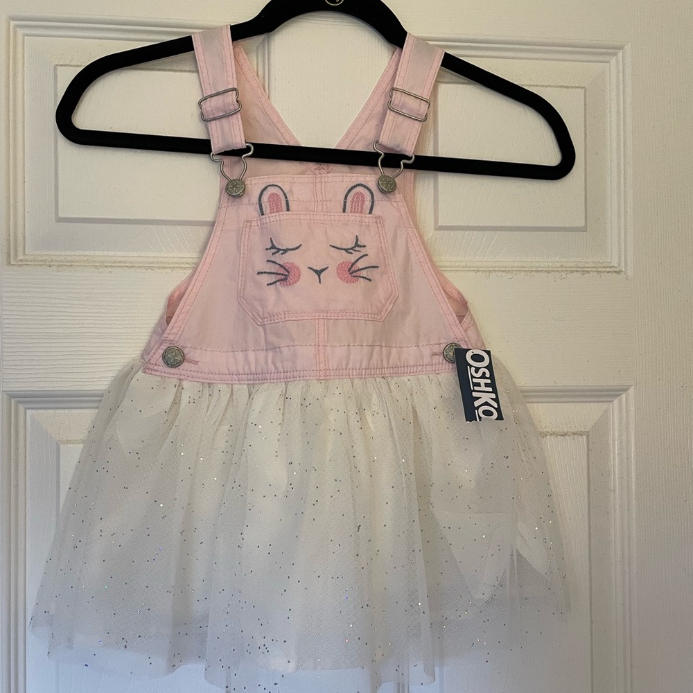 OshKosh coverall dress. Size 3T. Never worn. Tag is attached but ripped.